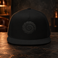 Trucker Cap — Subtle Spiral Embroidered Black Snapback